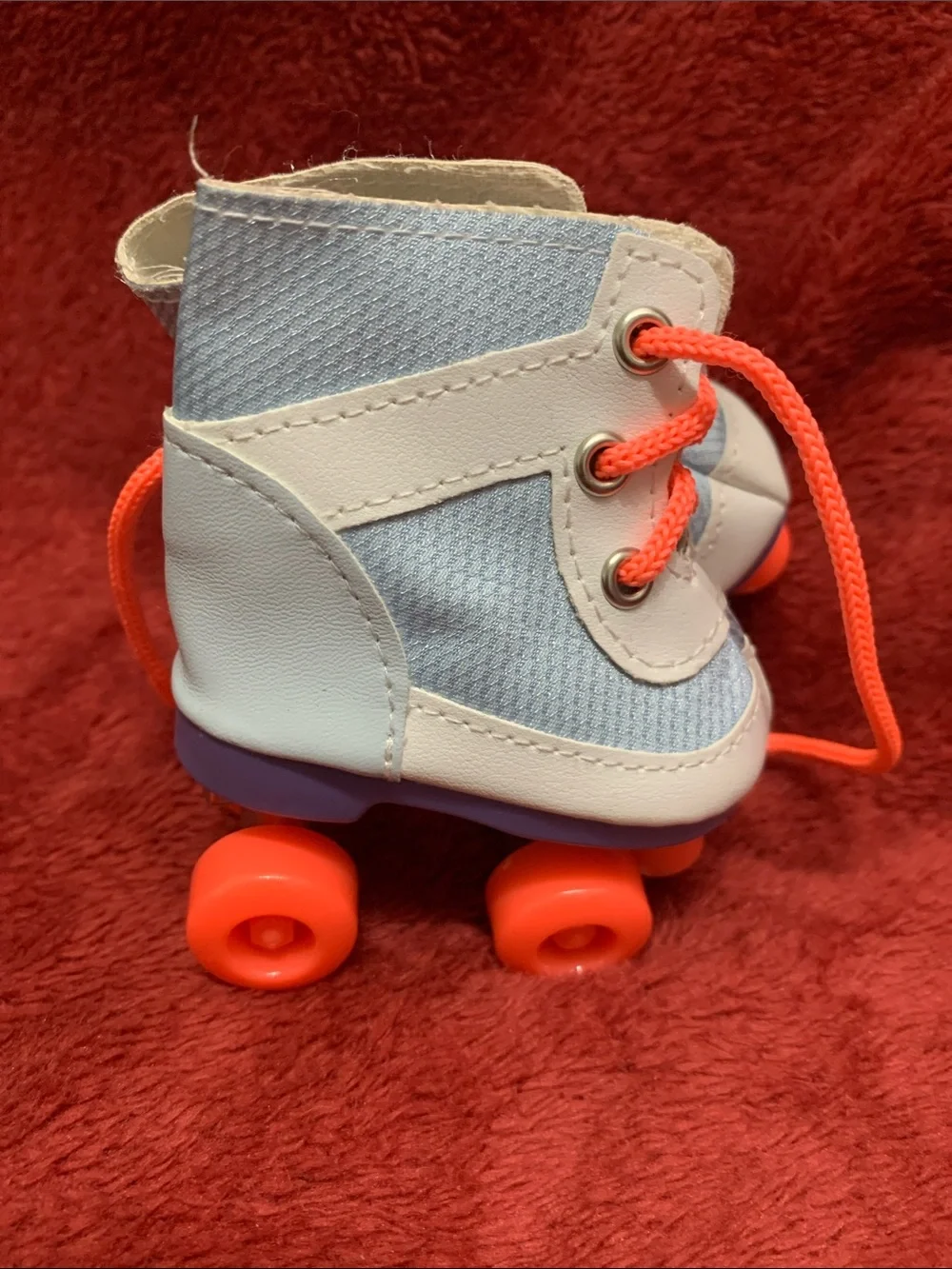 Kids Light Blue High-Top Roller Boots with Bright Orange Laces